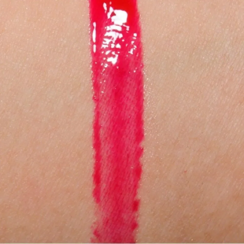 NIB MAC Archie’s Girls Lipglass in “Strawberry Malt”